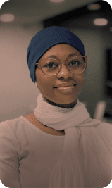 Woman in white scarf and glasses